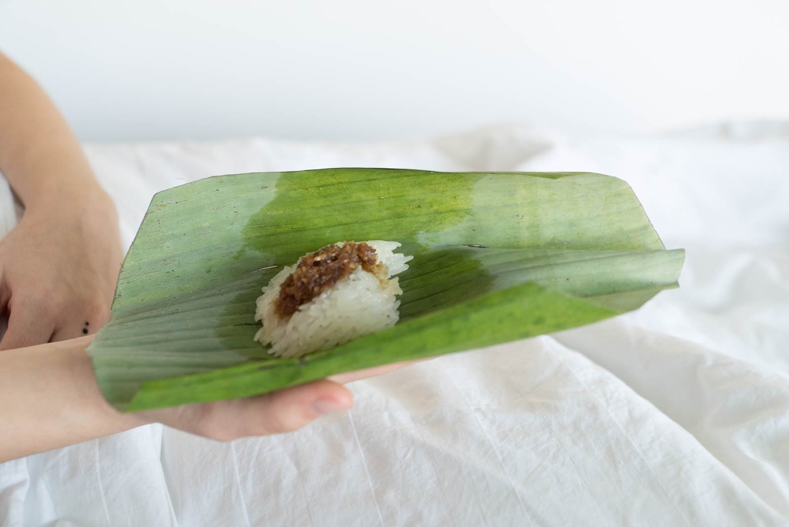 Sticky rice with mango in banana leaf